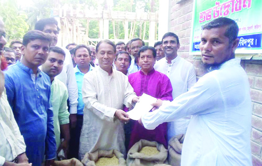 MODHUKHALI (Faridpur ): Md Monjur Hossain MP inaugurating Boro paddy procurement drive directly from the farmers at Modhukhali on Saturday