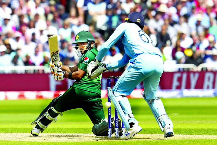 Pakistan's Babar Azam plays a shot during the Cricket World Cup match between England and Pakistan at Trent Bridge in Nottingham on Monday. Babar Azam made 63 to help Pakistan to score 348 for the loss of eight wickets in 50 overs.