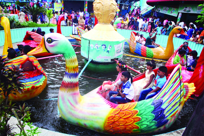 The recreation centers of the city were over crowded during Eid holidays. The snap was taken from the city's Shishu Mela on Friday.