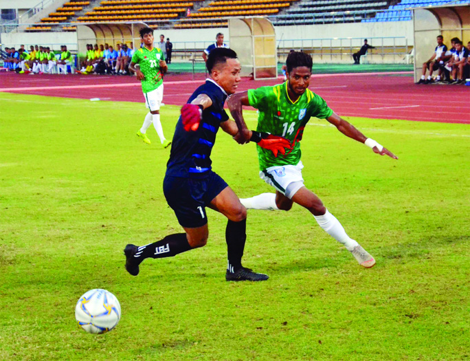 An action from the match in the first leg joint pre-qualifiers Round-1 of FIFA World Cup 2022 and AFC Asian Cup 2023 between Bangladesh and Laos at the New Lao National Stadium in Vientiane, Laos on Thursday.