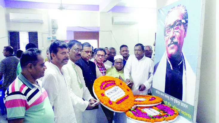 BARISHAL: Leaders of Awami League , Barishal City and District Unit placing wreath 5 at the portrait of Bangabandhu Sheikh Mujibur Rahman on the occasion of the Historic 6-Point Day on Friday.
