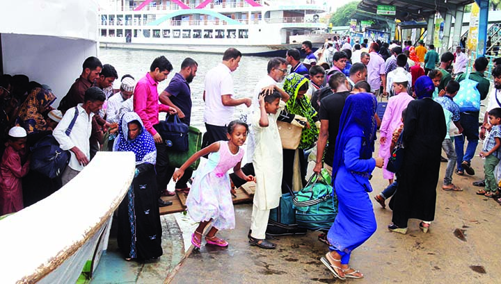 Home goers of southern region of the country coming back after celebrating Eid-ul-Fitr with their family members . This picture was taken from Sadarghat Launch Terminal yesterday .