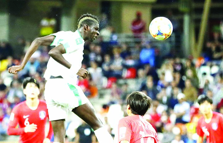 Senegal's Dia Ndiaye heads the ball during the quarter final match between Korea Republic and Senegal at the U20 World Cup soccer in Bielsko Biala, Poland on Saturday.