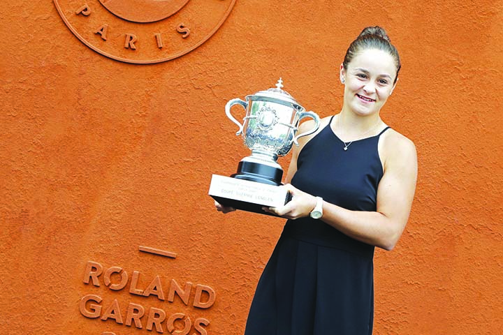 Australia's Ashleigh Barty poses with the trophy during a photo call at the Roland Garros stadium in Paris on Sunday. Barty won the French Open tennis tournament women's final on Saturday.