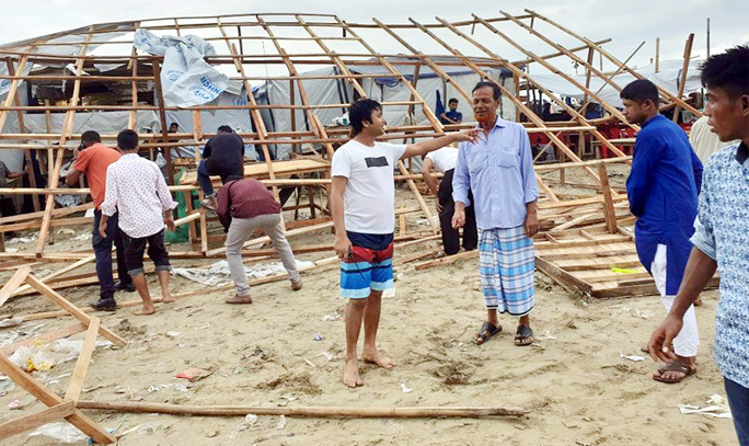 Illegal constructions including a market were evicted at Sugandha Point in Cox's Bazar Sea Beach by District Administration on Saturday .