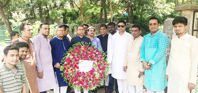 Asif Kamal Chowdhury Rabu Smriti Foundation at Chattogram placing wreaths at his grave marking his 14th death anniversary recently.