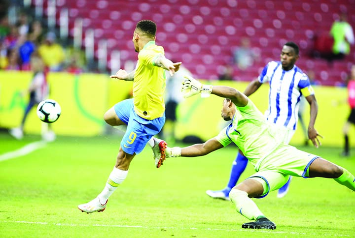 Brazil's Gabriel Jesus scores his side's 4th goal during a friendly soccer match against Honduras at the Beira Rio stadium in Porto Alegre, Brazil on Sunday.