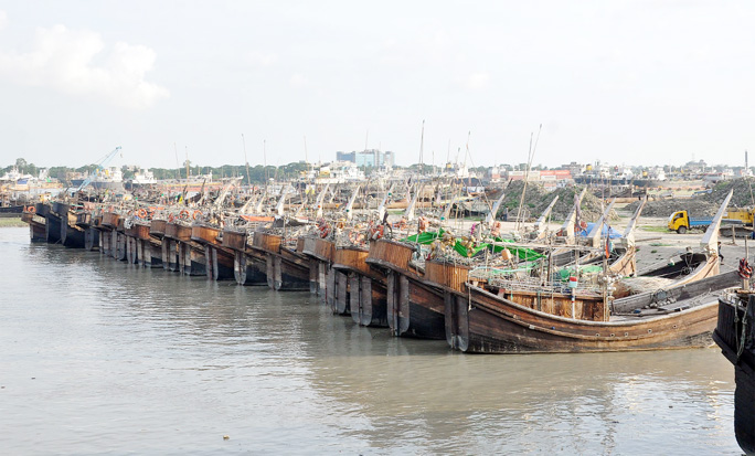 Fishing boats remain idle at Fisheries Ghat due to fishing ban in the Bay. This snap was taken yesterday.