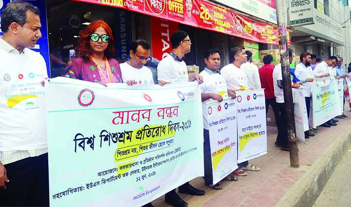Ministry of Labour and Employment formed a human chain in the city's Kawran Bazar on Wednesday in observance of World Day against Child Labour.