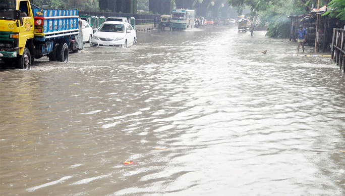 Low- lying areas at Port City submerged due to heavy rainfall . This picture was taken from Muradpur yesterday.