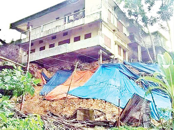 The damaged structures of three years back at Kaderia Market building in Kallyanpur area in Rangamati town to be repaired yet. Local residents fear that major accidents might occur with the collapse of the shabby buildings at any time in the rainy seaso