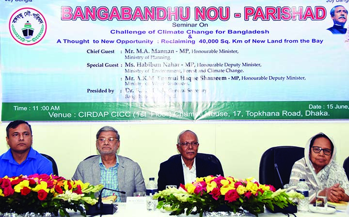 Planning Minister MA Mannan, among others, at a seminar on 'Challenge of Climate Change for Bangladesh & A Thought to New Opportunity: Reclaiming 40,000 sq. km of New Land from the Bay' organised by Bangabandhu Nou Parishad in CIRDAP auditorium in the c