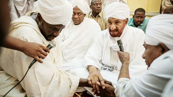 Sudanese opposition leader and former premier Sadiq al-Mahdi attends Friday prayers at a mosque linked to his National Umma Party in Khartoum's twin city of Omdurman on Friday.