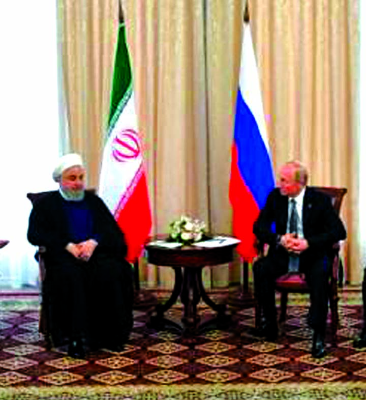 Russia's President Putin meets with Iran's President Rouhani on the sidelines of the Shanghai Cooperation Organisation (SCO) Summit in Bishkek on Friday.
