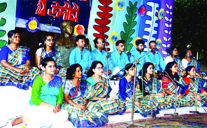 Udichi Shilpa Goshthi performing songs at Nazrul Mancha of Bangla Academy welcoming the 'Barsha' on the first day of Ashar on Saturday.