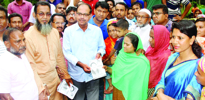 BOGURA: BNP and 20-party Alliance nominated candidate of by-election of Bogura-6 seat Golum Mohammad Siraj distributing leaflets at Nunagola Union on Saturday.