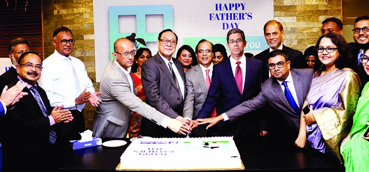 A Rouf Chowdhury, Chairman of Bank Asia cutting a cake on the occasion of Father's Day-2019 at its Corporate Office yesterday.