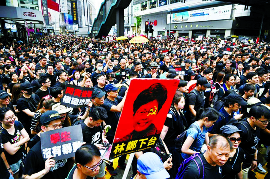 Thousands of protesters are calling for Hong Kong's leader Carrie Lam to step down on Sunday.