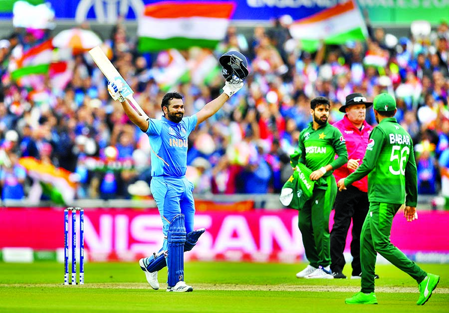 Rohit Sharma of India, celebrating his century during the match of the ICC World Cup Cricket between India and Pakistan at Old Trafford in Manchester, England on Sunday. India piled up a massive total of 336 for the loss of five wickets in the allotted 50