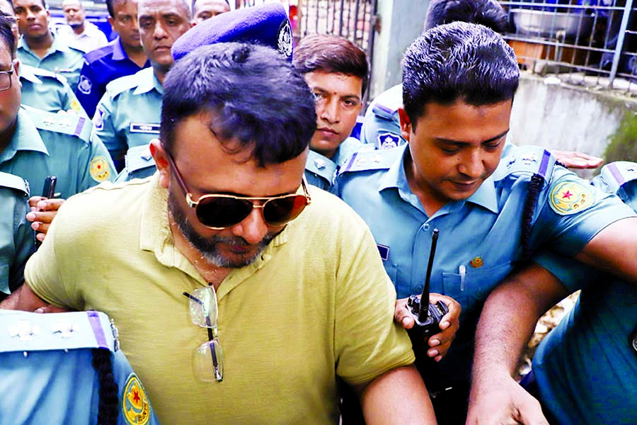 Former OC of Sonagazi Moazzem Hossain being taken to ICT in Dhaka in a case filed under The Digital Security Act. But the Tribunal rejected the bail and sent to jail on Monday.
