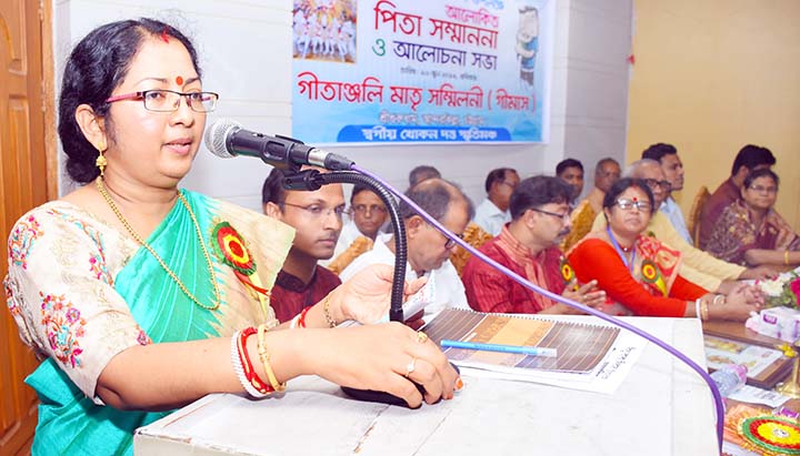 Social worker Anita Chowdhury speaking at a reception programme of Gitanjoli marking the World Father's Day on Sunday.
