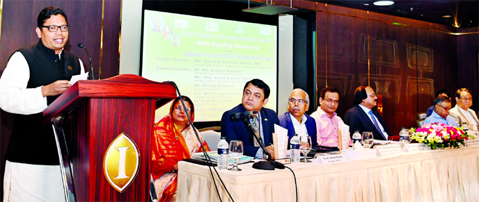 Junaid Ahmed Polok, MP, State Minister for Information, Communication and Technology, addressing a Memorandum of Understanding (MoU) signing programme organised by Bangladesh Hi-Tech Park Authority (BHTPA) at a city hotel on Monday. Hosne Ara Begum, BHTP