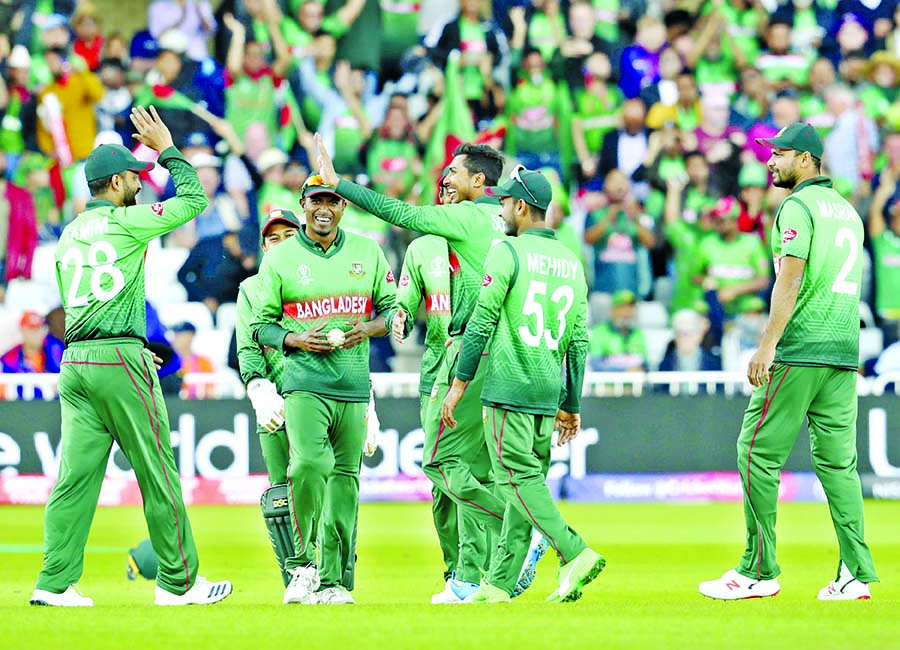 Bangladesh's Soumya Sarkar (third right) celebrates with teammates the dismissal of Australia's captain Aaron Finch during the ICC World Cup Cricket match between Australia and Bangladesh at Trent Bridge in Nottingham on Thursday. Soumya grabbed three w