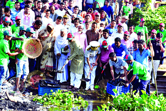 State Minister for Shipping Khalid Mahmud Chowdhury inaugurating the cleaning programme for removal of wastage and garbage from the bank of Turag River in Abdullahpur area on Saturday.