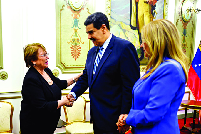 UN High Commissioner for Human Rights Michelle Bachelet (L) called for Venezuelan President Nicolas Maduro Â© to release jailed dissidents.