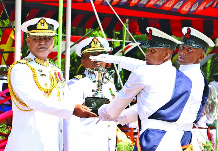 Chief of Naval Staff Admiral Aurangzeb Chowdhury awarding ' Naval Chief Award' to all-rounder Md Shahin at education concluding parade of fresh seamen at Naval base Bangladesh Naval Ghati Titumir Prade Ground in Khulna yesterday. ISPR photo