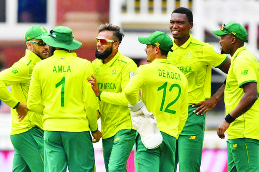 Players of South Africa celebrate after dismissal of Fakhar Zaman during the match of the ICC World Cup Cricket match against Pakistan at the Lord's in London on Sunday.