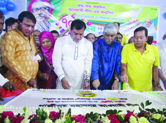 GAZIPUR: Adv Md Jahangir Alam, Mayor Gazipur City Corporation cutting cake marking the 70th founding anniversary of Awami League organised by Gazipur City Awami League at party office on Sunday.