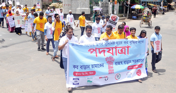 Anti- Tobacco Organisations brought out a procession demanding to increase tax upon tobacco products at DC Hill area in Port City yesterday.