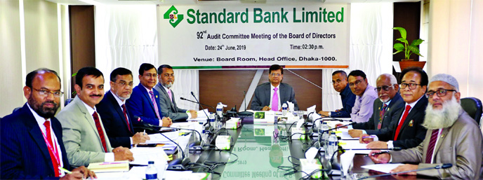 Md Nazmus Salehin, Chairman of the Audit Committee of the Board of Directors of Standard Bank Ltd, presiding over the Bank's 92nd board meeting at its board room in the city on Monday. Members of the committee Al-Haj Mohammed Shamsul Alam, Kazi Sanaul Ho