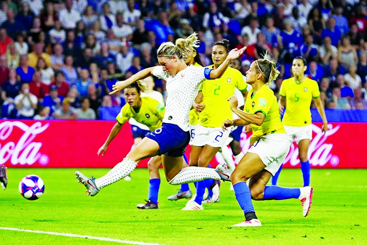 France's Amandine Henry scores her side's 2nd goal during the Women's World Cup round of 16 soccer match between France and Brazil at the Oceane stadium in Le Havre, France on Sunday.