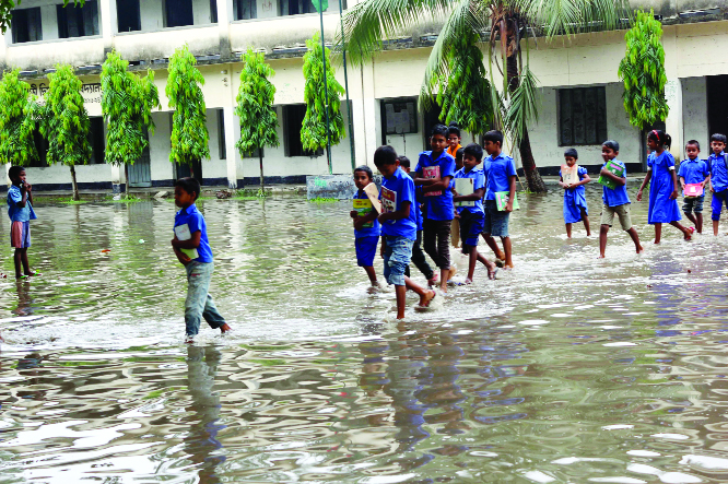 DINAJPUR: The school compound of Jharbari High School at Birganj Upazila has been inundated after rainfall on Saturday.