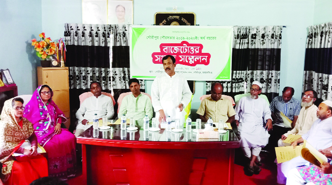 GOURIPUR (Mymensingh): Syed Rafiqul Islam, Mayor, Gouripur Pourashava announcing the poura budget of Tk 54 cr at Pourashav a Conference Room as Chief Guest on Saturday.