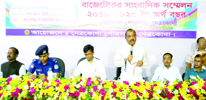 NETRAKONA: Mohammad Nazrul Islam Khan, Mayor of Netrakona Pourasava announcing budget for 2019-2020 financial year at a press conference at Pourasava Conference Room yesterday. Main- ul -Islam, DC, Netrakona was present as Chief Guest in the program