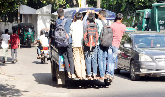 Students traveling risky on a maxi at Jamalkhan area in Chahtogram. . This snap was taken yesterday.