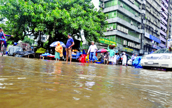 Motijheel Commercial hub suffered temporary waterlogging on Sunday following brief rain but the city dwellers heaved a sigh of relief from scorching heat for few days.