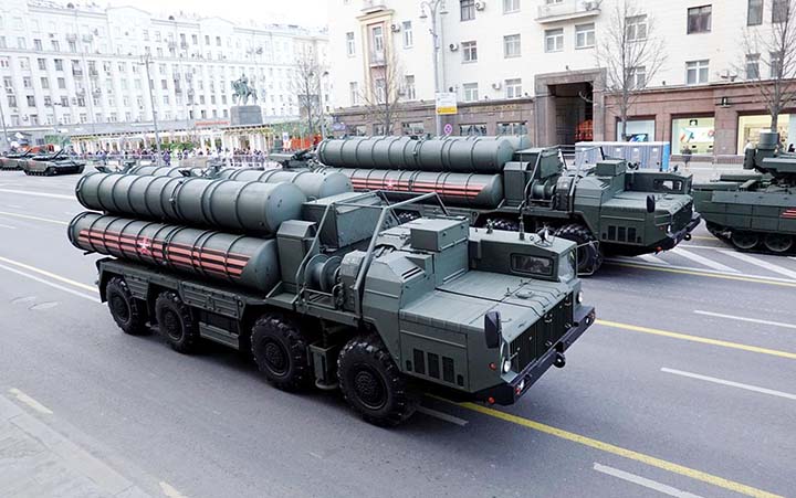 Russian servicemen sit in the cabins of S-400 missile air defence systems in Tverskaya Street before a rehearsal for the Victory Day parade, which marks the anniversary of the victory over Nazi Germany in World War Two, in Central Moscow, Russia.