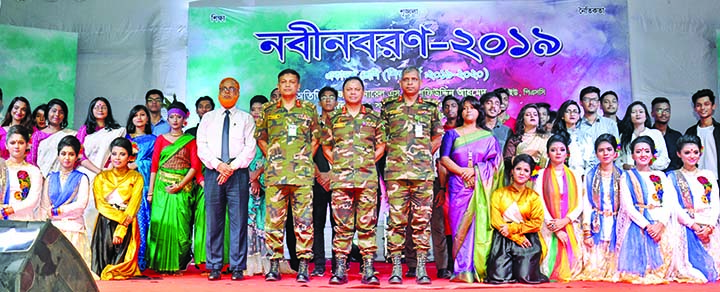 Logistics Area Commander of Army Major General SM Shafiuddin Ahmed poses for a photo session with the newly admitted HSC students in the city's Adamjee Cantonment College at the orientation ceremony held on Tuesday. ISPR photo