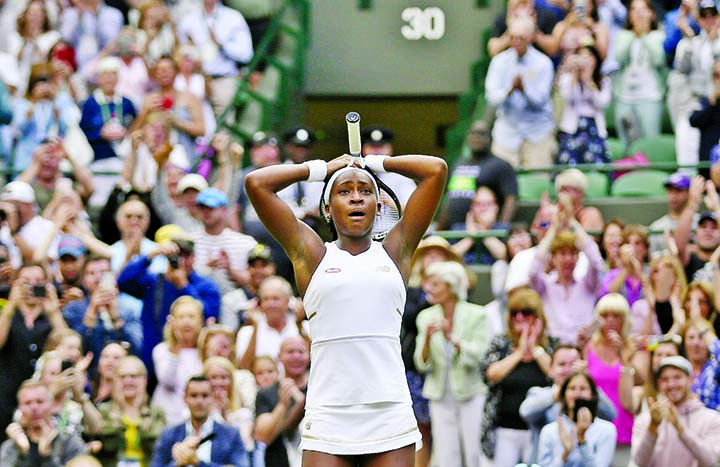 United Statesâ€™ Cori â€˜Cocoâ€™ Gauff reacts after beating United States's Venus Williams in a Women's singles match during day one of the Wimbledon Tennis Championships in London on Monday.