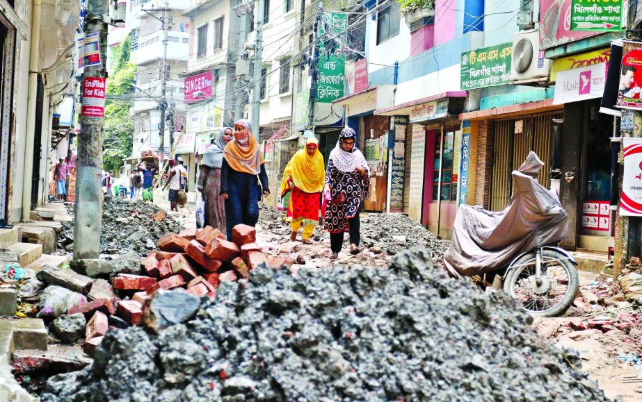 Part of a road at Tilpapara, Khilgaon remains unrepaired for months together causing much distress to the residents of the area far and near. The photo was taken on Tuesday.