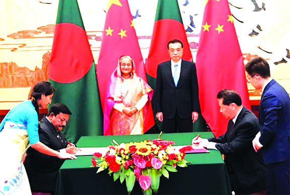 Dhaka, Beijing inking nine instruments on various sectors in presence of Bangladesh Prime Minister Sheikh Hasina and her Chinese counterpart Li Keqiang at the Great Hall of People in China.