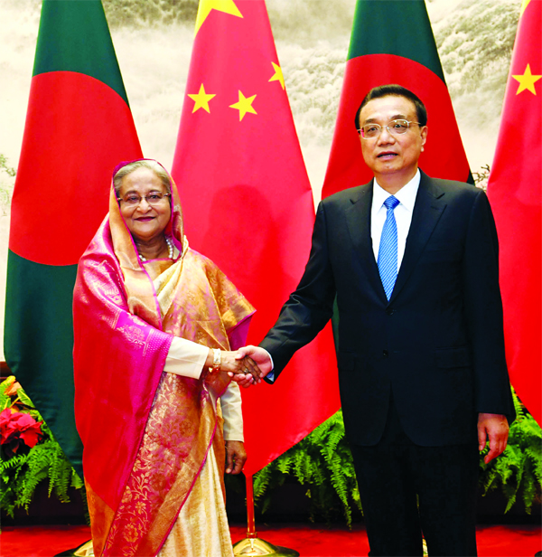 Prime Minister Sheikh Hasina was received by counterpart Li Keqiang on her arrival at the premises of the Great Hall in Beijing on Thursday.