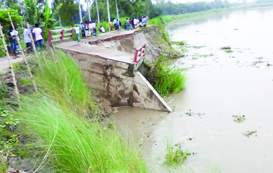 MIRZAPUR (Tangail): Bridge and road have been damaged at Fathapur area due to erosion of River Banshahi recently .