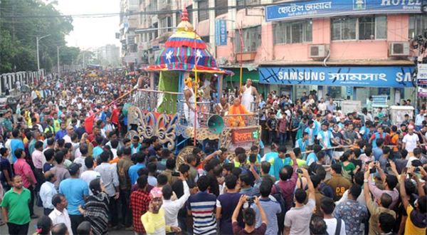 Ratha Yatra seen passing the city street on Wednesday participated by a large numbers of devouts to Sri Jagannath Dev. NN photo