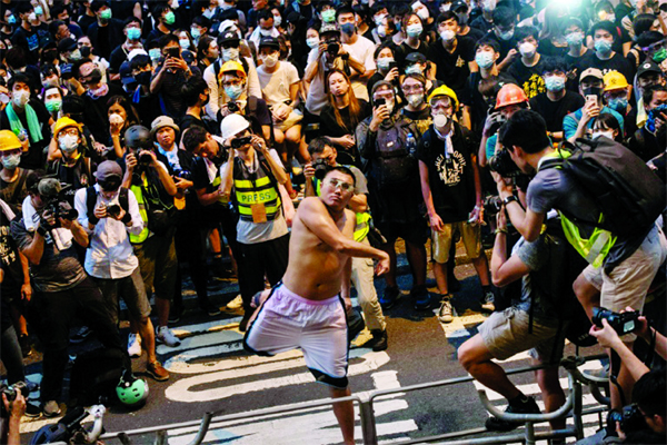 Well-known activist Ho-chiu Pun was seen throwing multiple eggs at the police headquarters Hong Kong last month.