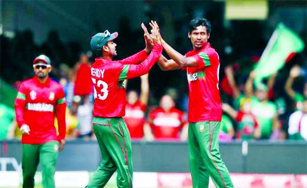 Mustafizur Rahman (right) celebrates with his teammate Mehidy Hasan Miraz after dismissal of the wicket of Imad Wasim in their match of the ICC World Cup Cricket between Bangladesh and Pakistan at the Lord's in London on Friday. Mustafiz captured five wi